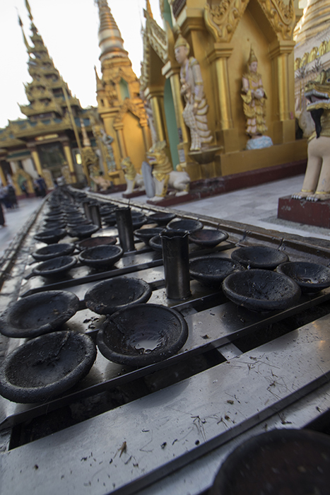 Candle Dishes at Shwedagon Pagoda - Yangon, Myanmar